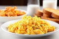 sausage links next to scrambled eggs and toast Royalty Free Stock Photo