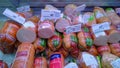 Sausage and lunch meat products on a supermarket shelves. Retail industry. Concept of problem rising food price. Sale and shopping