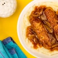 Sausage And Mashed Potatoes With Onion Gravy Royalty Free Stock Photo