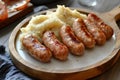 Sausage and mashed potatoes on white plate, background open for text or simple food quote Royalty Free Stock Photo