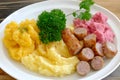 Sausage and mashed potatoes on white plate, background open for text or simple food quote Royalty Free Stock Photo