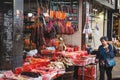 Sausage and meat hanging in traditional butchery street market in Hong Kong