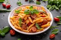 Sausage penne Pasta with tomato sauce and fresh herbs Royalty Free Stock Photo