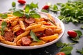 Sausage penne Pasta with tomato sauce and fresh herbs Royalty Free Stock Photo