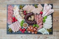 Sausage plate variation on a wooden table Royalty Free Stock Photo