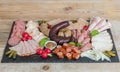 Sausage plate variation on a wooden table Royalty Free Stock Photo