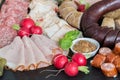 Sausage plate variation on a wooden table