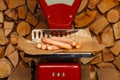 Sausage on red scales Royalty Free Stock Photo