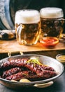 Sausage. Roasted chorizo sausage. Roasted spicy sausage chorizo home hotel or restaurant with beer vine brandy cognac whiskey.