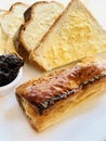 Sausage roll with bread and butter Royalty Free Stock Photo