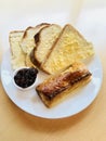 Sausage roll with bread and butter Royalty Free Stock Photo