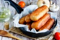 Sausage rolls, pastry wrapped sausages, fried meat sausages in blankets, sausage pies in dough Royalty Free Stock Photo