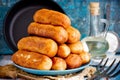 Sausage rolls, fried meat sausages in blankets, sausage pies in dough Royalty Free Stock Photo