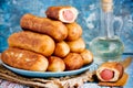 Sausage rolls, pastry wrapped sausages, fried sausages in blankets, sausage pies in dough Royalty Free Stock Photo