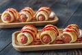 Sausage rolls on the wooden tray Royalty Free Stock Photo