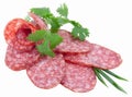 Sliced dry semi-smoked sausage isolated