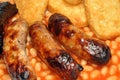 Sausages, Beans And Hash Browns Royalty Free Stock Photo