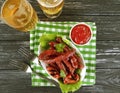 Sausages bratwurst grilled beer salad cooking on a wooden background table Royalty Free Stock Photo