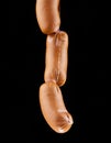 Sausages on a black background Royalty Free Stock Photo