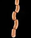 Sausages on a black background Royalty Free Stock Photo
