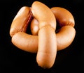 Sausages on a black background Royalty Free Stock Photo