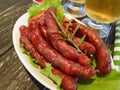 Sausages bratwurst grilled beer fried on a wooden table Royalty Free Stock Photo