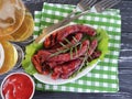 Sausages bratwurst grilled beer rustic homemade on a wooden table Royalty Free Stock Photo