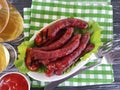 Sausages bratwurst grilled beer rustic on a wooden table Royalty Free Stock Photo