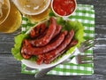 Sausages bratwurst grilled beer snack cooking on a wooden background table Royalty Free Stock Photo