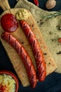 Sausages with cheese fried with spices and herbs