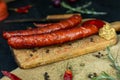 Sausages with cheese fried with spices and herbs