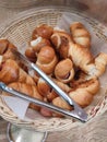 Sausages covered with spirally twisted dough and baked