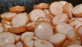 Sausages cut into pieces. Boiled sausage product. the process of cooking.