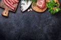 Sausages, fish and meat cooking Royalty Free Stock Photo