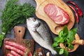 Sausages, fish and meat cooking Royalty Free Stock Photo