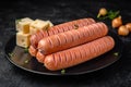Sausages fried with cheese. Nutritious, tasty Royalty Free Stock Photo