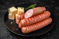 Sausages fried with cheese. Nutritious, tasty Royalty Free Stock Photo