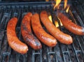 Sausages on a grill