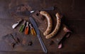 Sausages grilled food background, wood background. Royalty Free Stock Photo