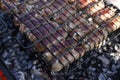 Sausages are grilled on the grill Royalty Free Stock Photo