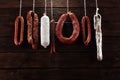 sausages hang from a rack at market. Country dark style. Traditional food. Smoked sausages meat hanging Royalty Free Stock Photo