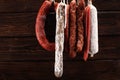 sausages hang from a rack at market. Country dark style. Traditional food. Smoked sausages meat hanging Royalty Free Stock Photo