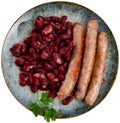 Sausages with red beans, typical Catalan dish butifarra con alubias