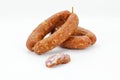 Sausages from Slovenia, cut on white background is Royalty Free Stock Photo