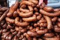 Sausages stacked in pile in Serbia. These are carniolan sausage, also called Kranjska klobasa, a typical slovenian smoked sausage