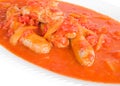 Sausages in tomato sauce. Royalty Free Stock Photo