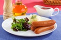 Sausages with vegetables salad Royalty Free Stock Photo
