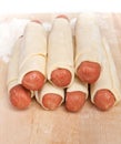 Sausages wrapped in raw puff pastry Royalty Free Stock Photo