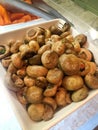 Saute button mushrooms