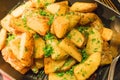 Saute Herbed Potato in a pan